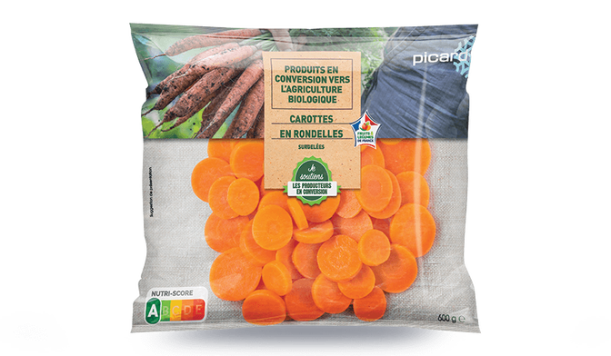 Carottes en rondelles en conversion vers l'agriculture biologique