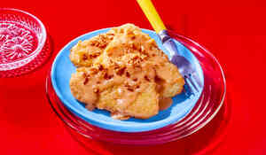 Hash browns potatoes, creamy cheddar, onion fried