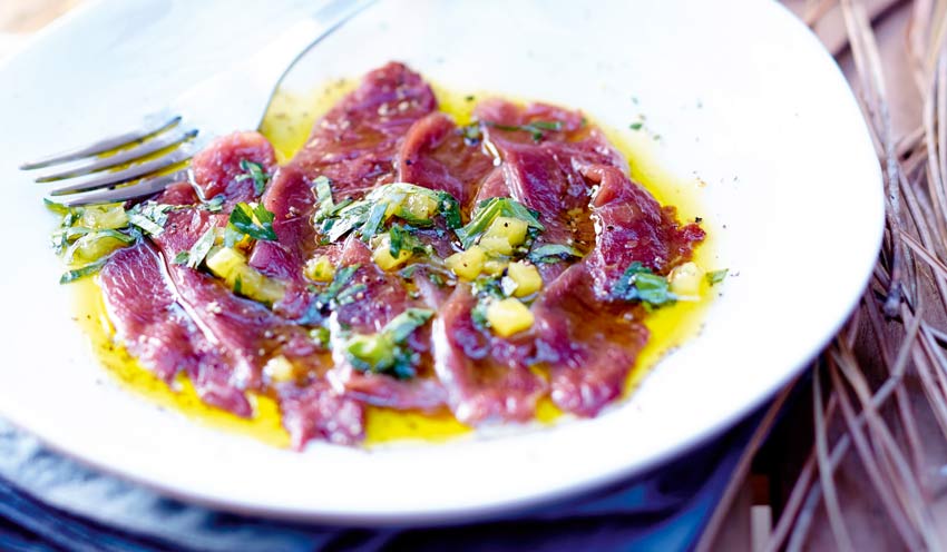 Carpaccio de magret de canard, vinaigrette aux fruits